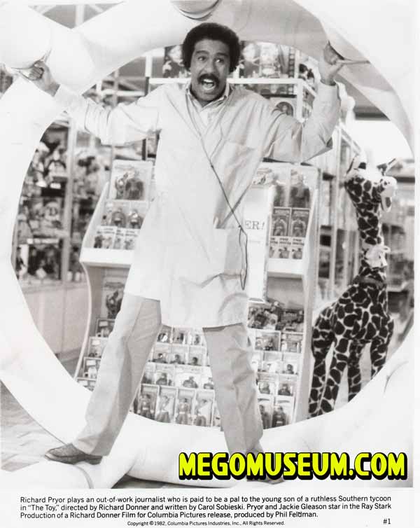 Richard Pryor cruises past a Mego Display in his Wonderwheel: Mego Museum.