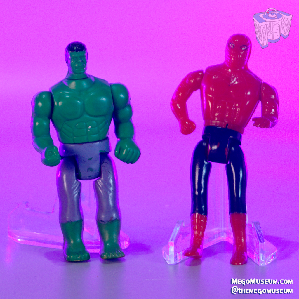 Produced long after Mego's demise, these figures were marketed on cardbacks mimicking the Kenner "Super Powers" brand. While based on the Pocket Superheroes, they are thinner plastic and hollow, secured with a large metal screw in the back; it is common for these to have "Jiggly legs."
